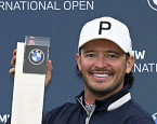 Европейский Тур: итоги турнира BMW International Open. Юэн Фергюсон рискует и выигрывает